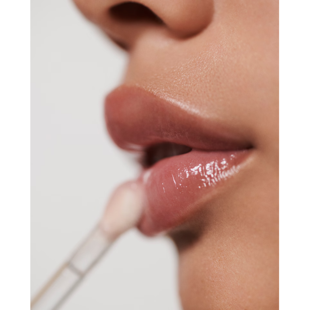 High-shine gloss plumps, perfects and protects lips in one glide. Now in five shade.